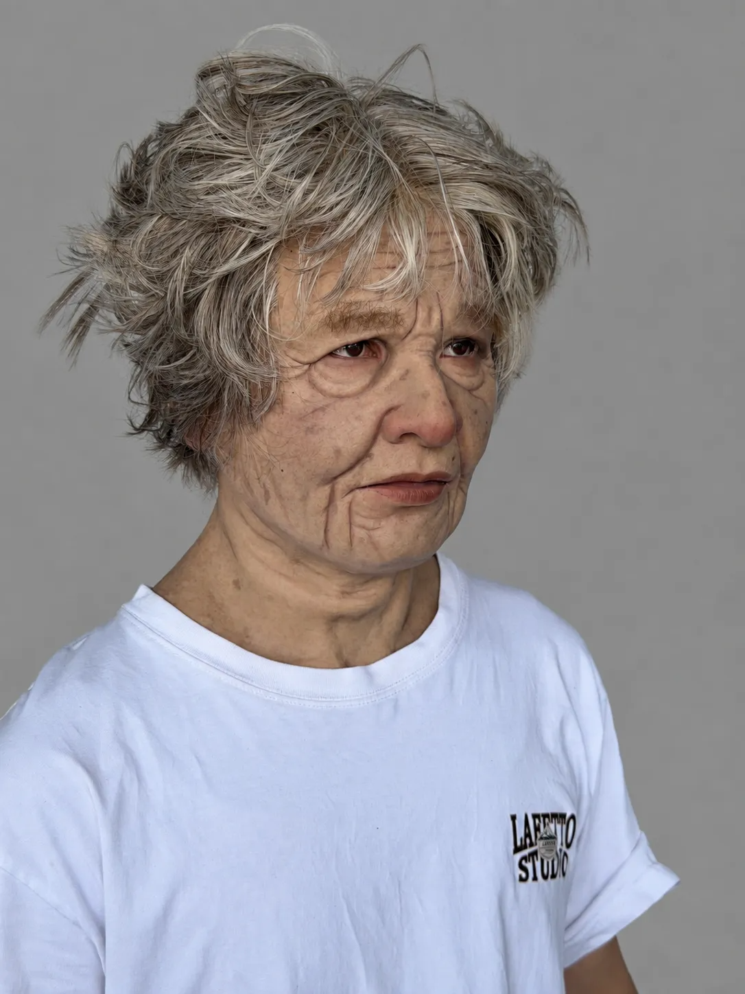 Realistic Silicone Mask of an Elderly Woman with Short Hair
