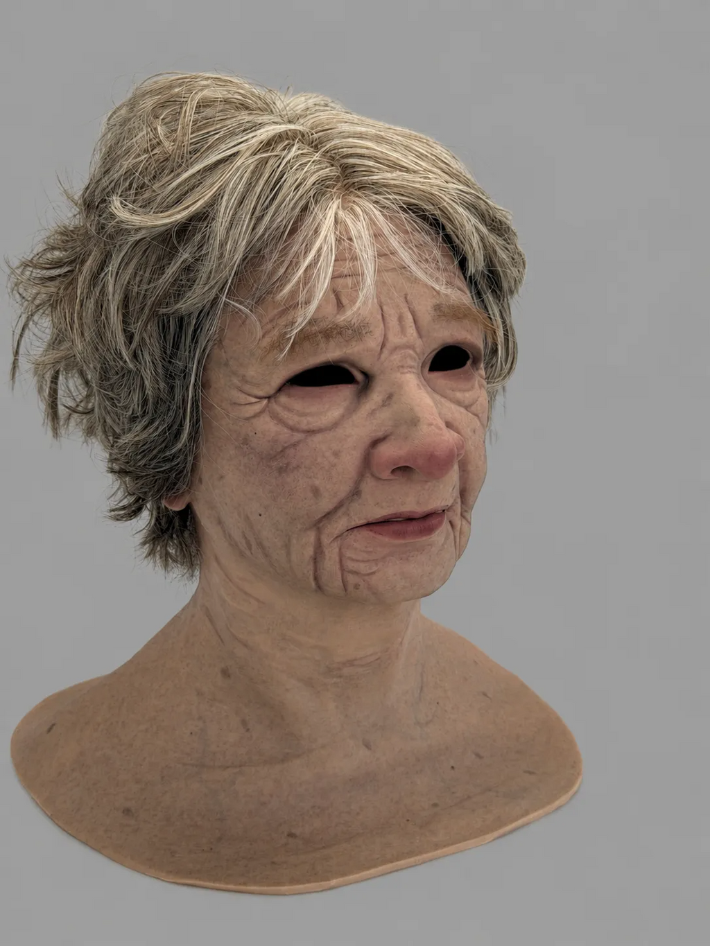 Realistic Silicone Mask of an Elderly Woman with Short Hair